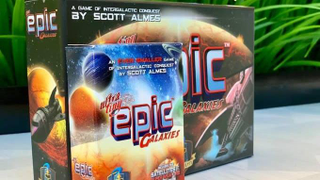 Comparing the new and original Tiny Epic Galaxies boxes.